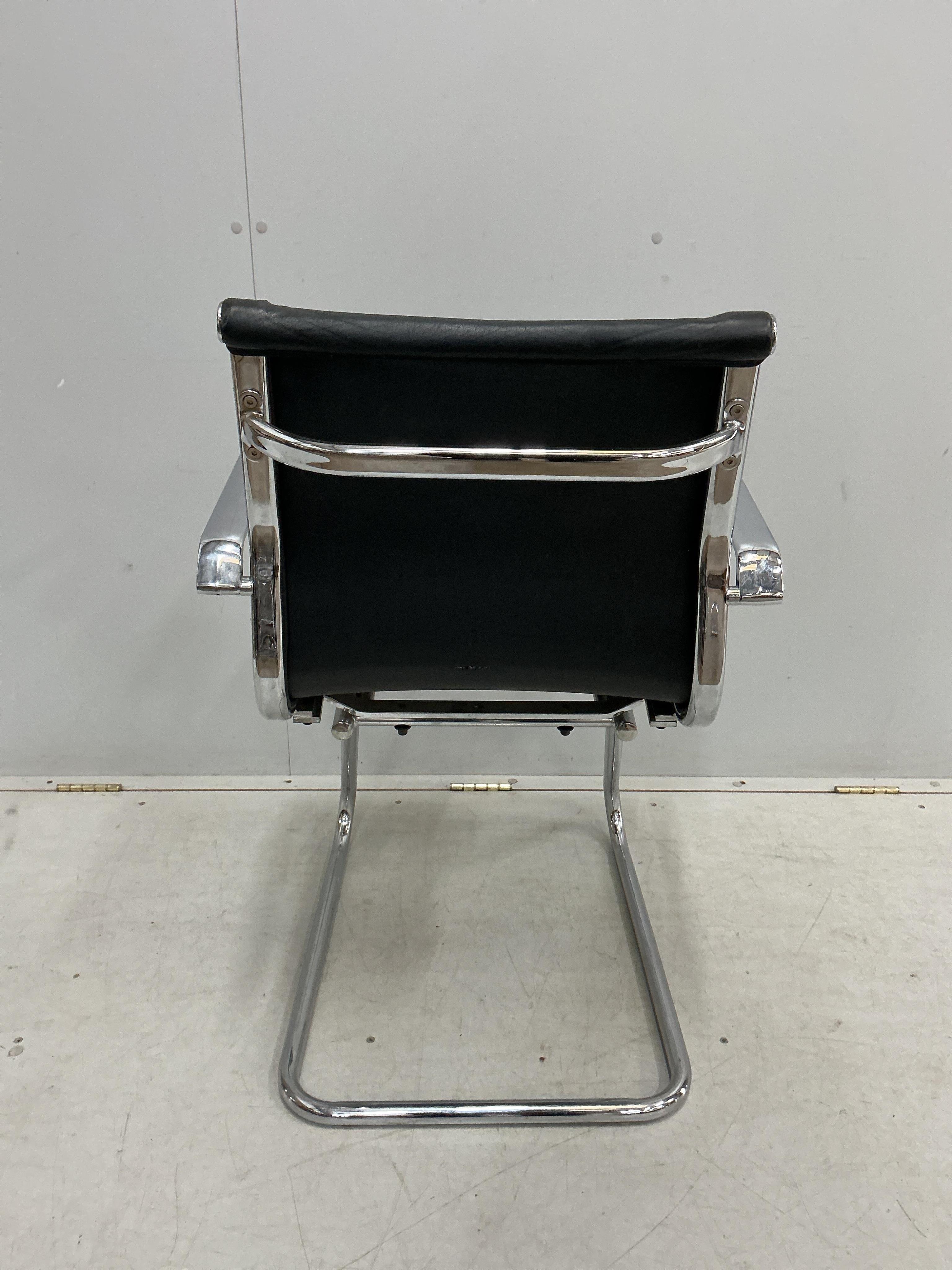A set of seven Aria chrome chairs, width 57cm, depth 56cm, height 87cm